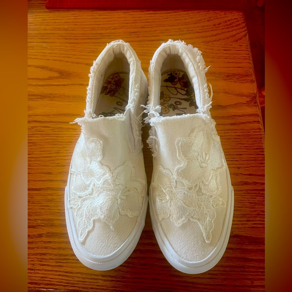 White loafers made by Blowfish